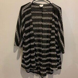 Lularoe woman’s shrug , EUC size M
